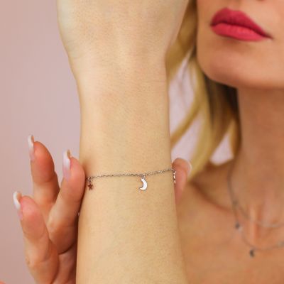 BR615 Bracelet with hanging moons and stars